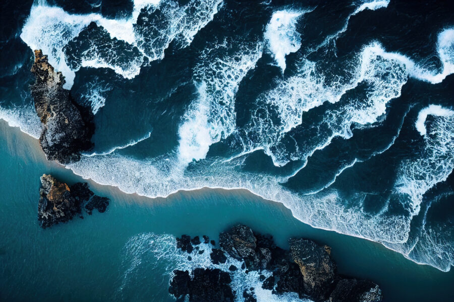 Spectacular drone photo, top view of seascape ocean wave crashing rocky cliff.