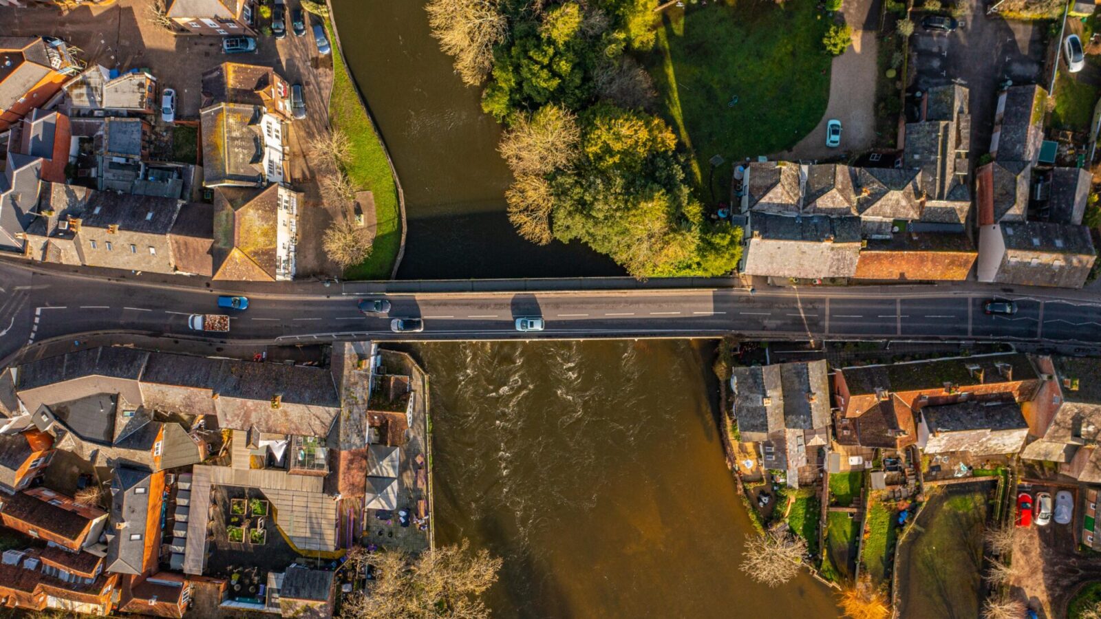 Aerial photo from a drone of the medieval road bridge in Fordingbridge that spans over the river.